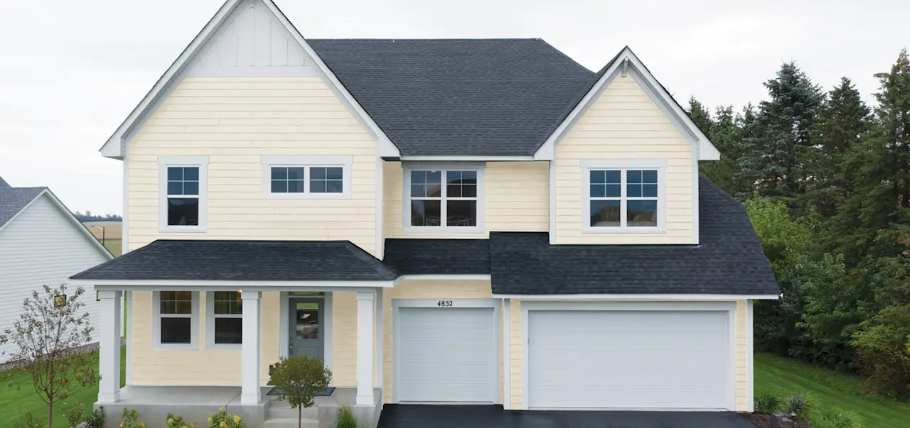 Home with LP SmartSide siding in Sand Dunes